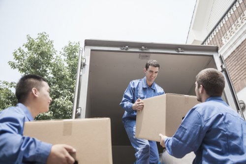 Organized short-term storage space in Sydenhamhill with packed boxes and furniture